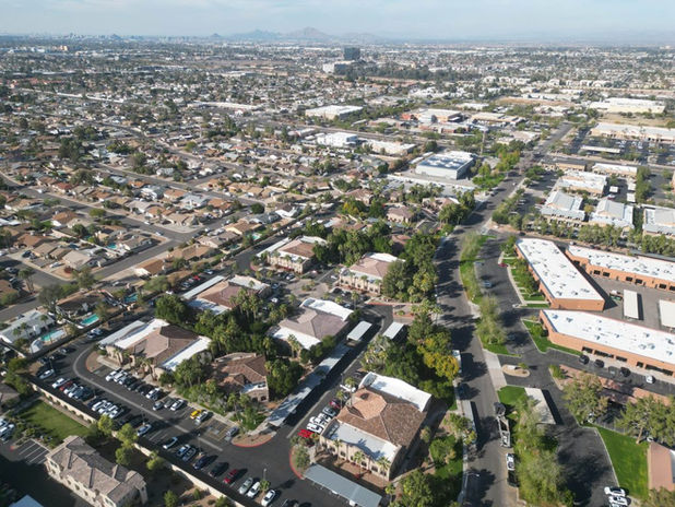 ImageRoof inspector reviewing findings with homeowner
